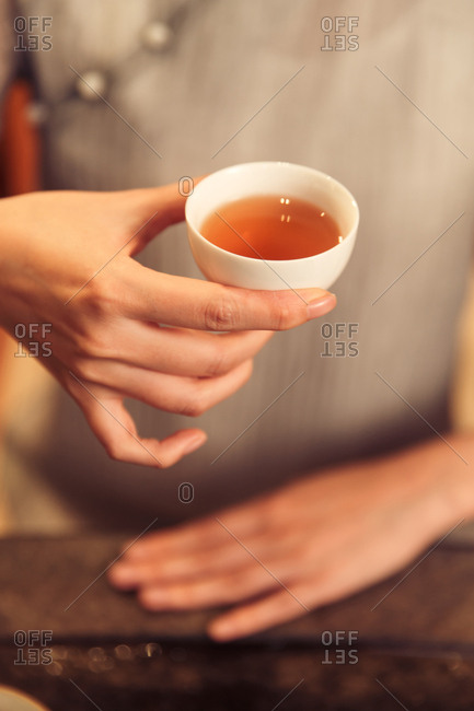 Young women drinking tea