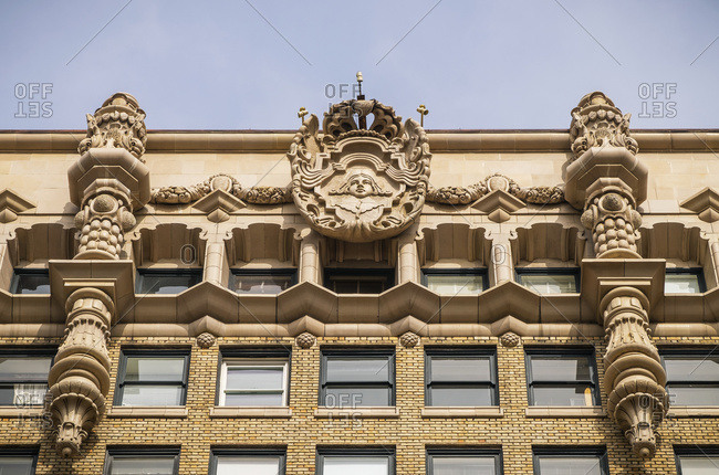 The facade at the top of the Million Dollar Theatre building; Los Angeles, California, United States of America