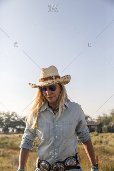 USA, Nevada, Wells, - September 19, 2014:  Founder Madeleine Pickens walks around the her 900 square mile property in NE Nevada where Mustang Monument, A sustainable luxury eco friendly resort and preserve for wild horses resides, Saving America's Mustangs Foundation