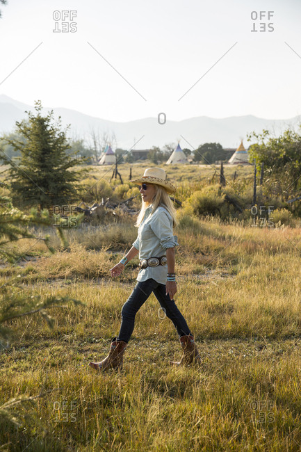 USA, Nevada, Wells,  - September 19, 2014: Founder Madeleine Pickens walks around the her 900 square mile property in NE Nevada where Mustang Monument, A sustainable luxury eco friendly resort and preserve for wild horses resides, Saving America's Mustangs Foundation