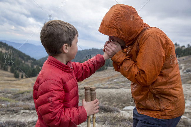 USA, Oregon, Ashland - October 30, 2014:  6 year old Christian Rego aka Buddy Backpacker hikes a part of the PCT near Ashland Oregon with his mom Andrea.