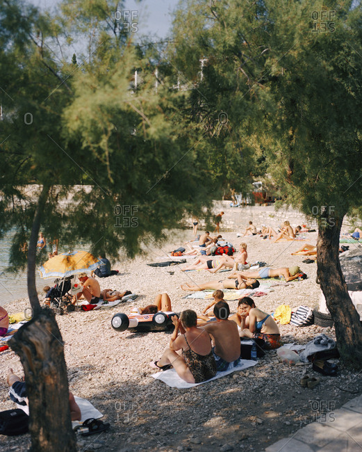 CROATIA, Hvar, Dalmatian Coast,  - September 28, 2010: Island, group of people relaxing on Dalmatian coast island