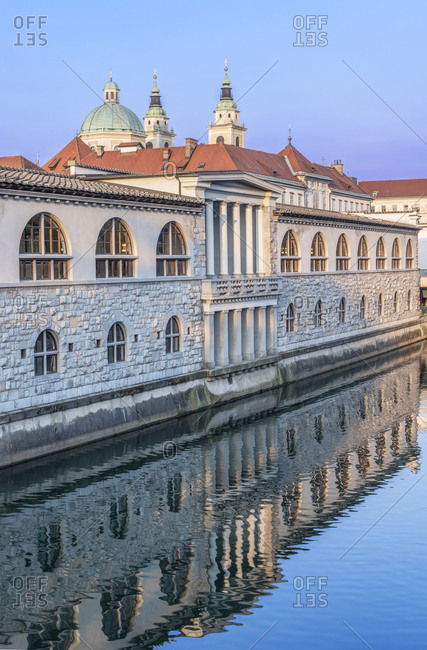 Ornate building reflected in river, Ljubljana, Central Slovenia, Slovenia,Ljubljana, Central Slovenia, Slovenia