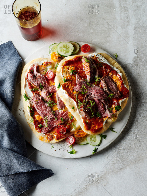 Char grilled lamb wraps with tomato achaar