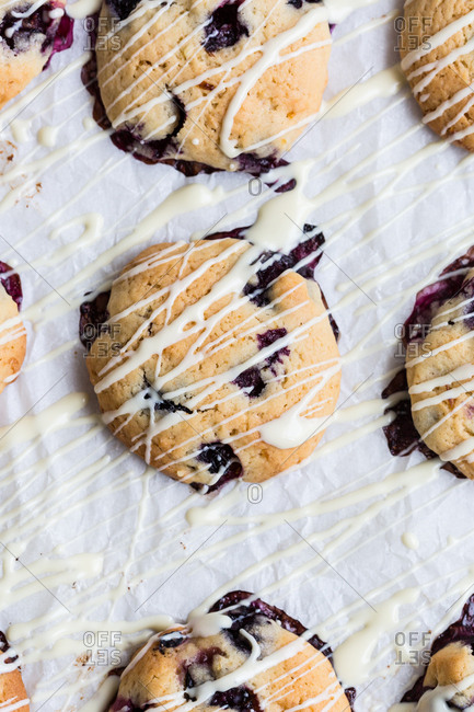 Close up of blueberry cookies drizzled with white chocolate