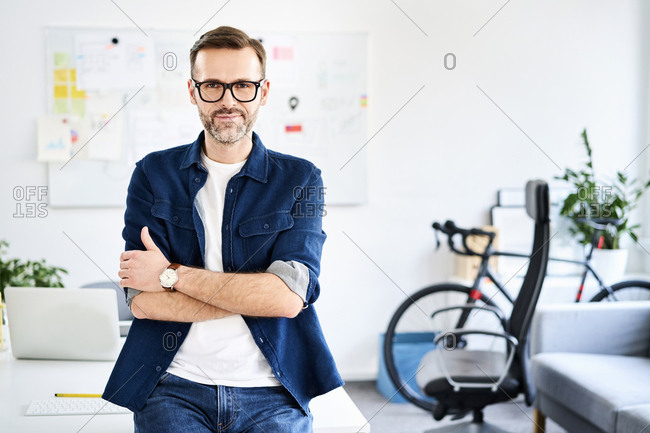 Portrait of confident businessman in office