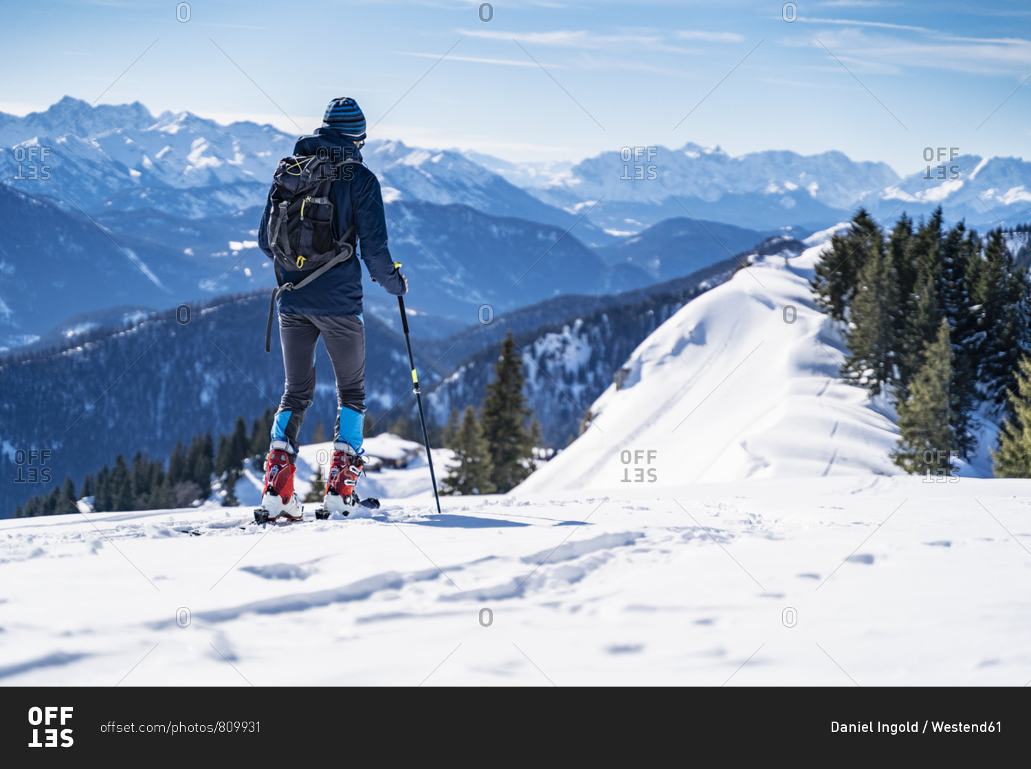 Germany- Bavaria- Brauneck- man on a ski tour in winter in the mountains