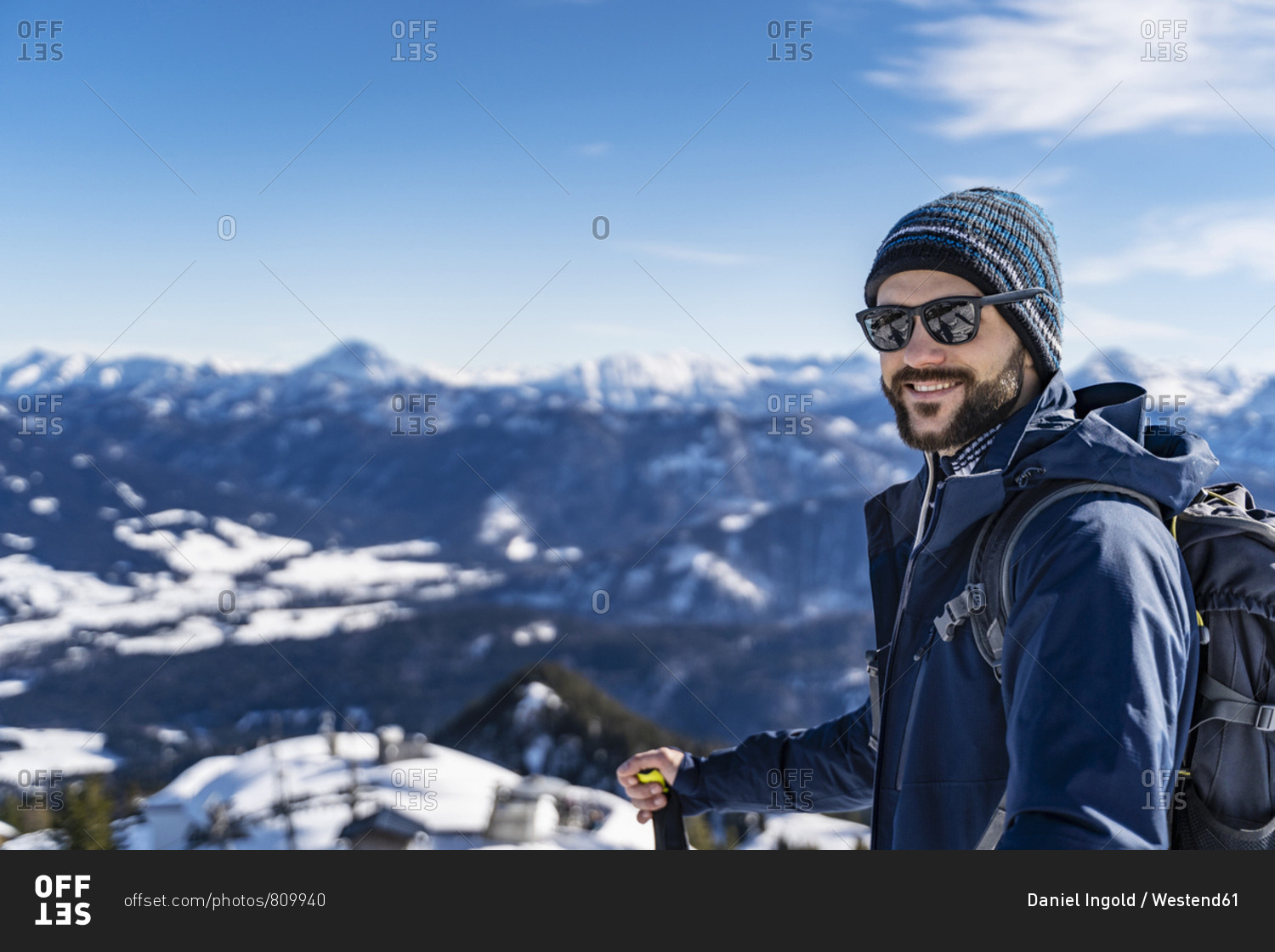 Germany- Bavaria- Brauneck- portrait of smiling man on a ski tour in winter in the mountains