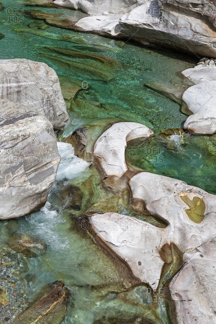 Switzerland- Ticino- Verzasca Valley- stones and rocks in clear turquoise waters of Verzasca river