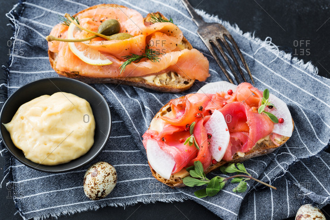 Seafood appetizers on striped towel