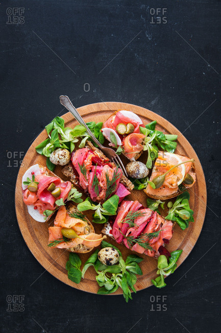 Seafood appetizers served on a wooden board
