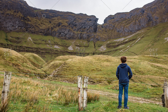 Boy looking Mountains in Ireland