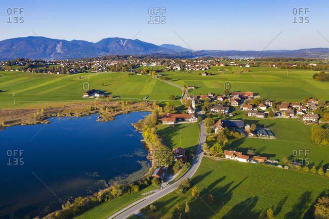 Germany- Upper Bavaria- Alpine foreland- Aerial view of Froschhausen- Froschhauser See- Murnau at Staffelsee in the background