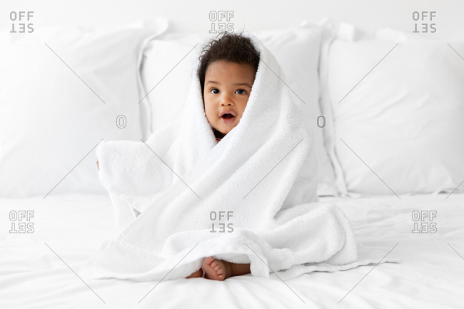 Baby wrapped in towel hot sale