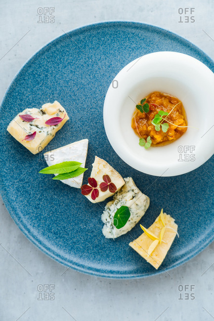 Cheese appetizer on blue plate