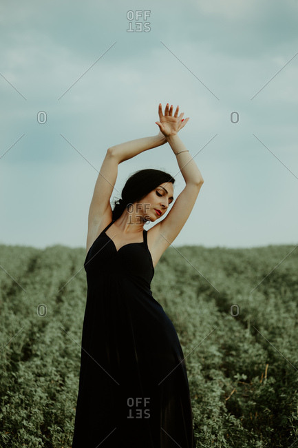 Female dancer in a black long dress