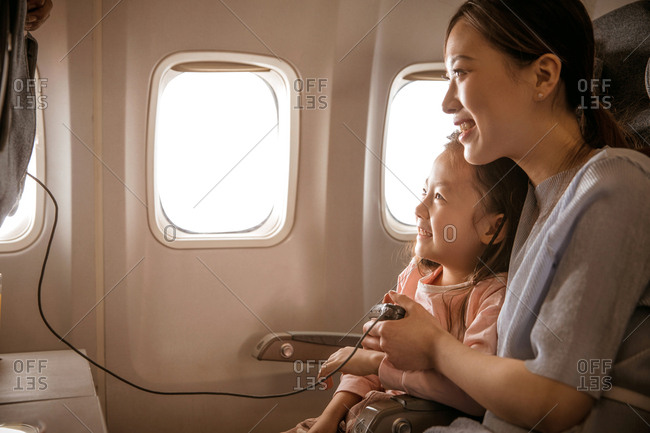 Happy family travel by plane