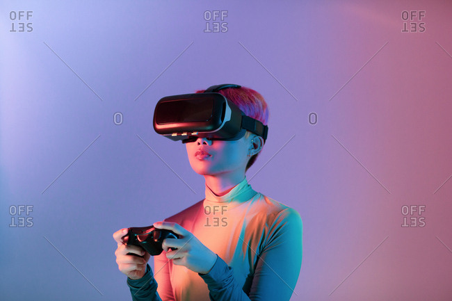 Creative shot of young adult using VR