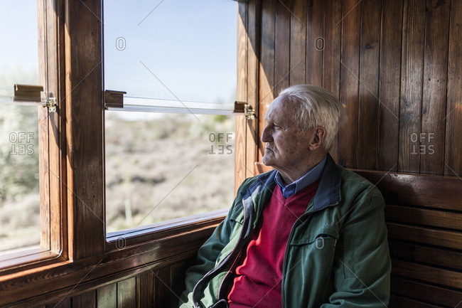 Journey to the memory of an old man travelling in the train of his youth, looking out the window