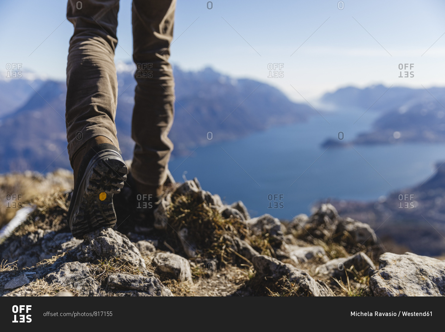 Italy- Como- detail of hiking boots on the rock