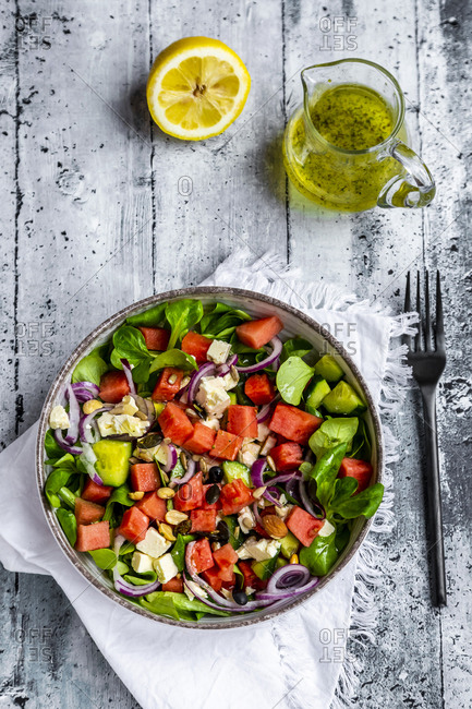 Lamb's lettuce with watermelon- feta- cucumber- red onion and nut