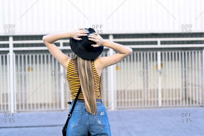 Rear view of teenage girl wearing hat