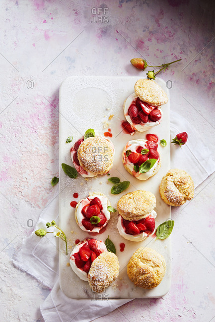 Overhead view of tray containing strawberry shortcake scones