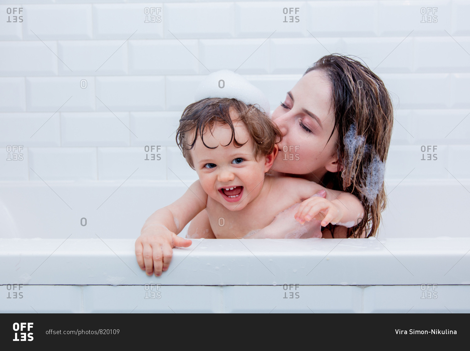 Mom With Son In The Bathroom While Bathing Stock Photo Offset