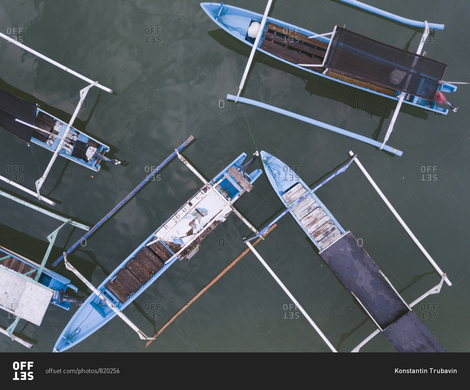 Banca boats in the ocean from above