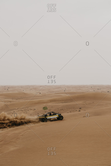 United Arab Emirates- Dubai- Lahbab Desert- 4x4 car driving through the desert