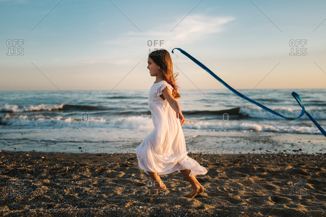 little white dress by the shore