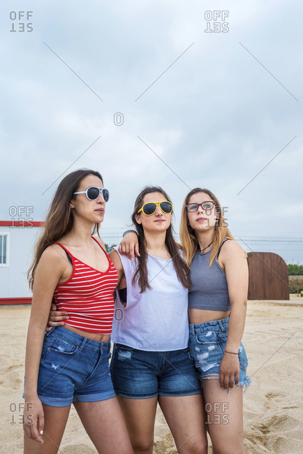 Group of female friends having fun on the beach
