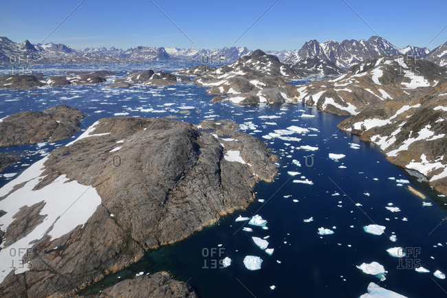 Greenland- East Greenland- Aerial view of Ammassalik island and fjord with pack or drift ice