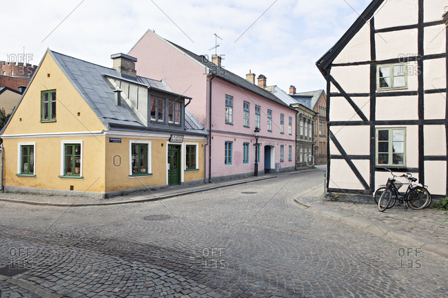 Lund, Sweden - April 13, 2019: Cute cobblestone street in Lund, Sweden