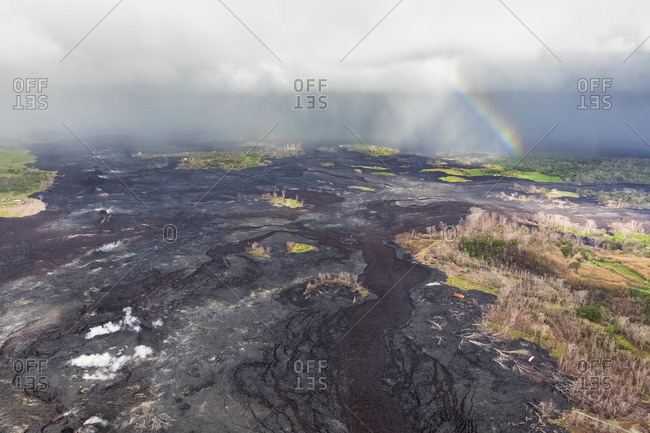 USA- Hawaii- Big Island- aerial view of the impacts of the volcanic eruption in 2018 with rainbow