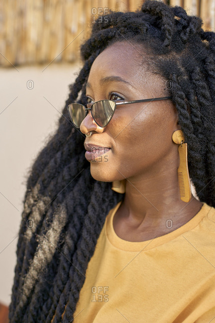 Portrait Of Young Woman With Nose Piercing Sunglasses And