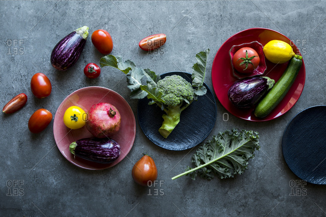 Vibrant red green purple and yellow vegetables.