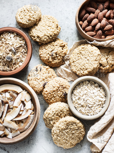 Ingredients for baking in bowls with cookies