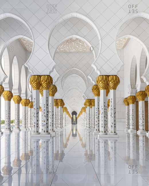 Sheikh Zayed Grand Mosque, Abu Dhabi, United Arab Emirates - March 16, 2019: Architectural Columns with Floral Patters in Sheikh Zayed Grand Mosque