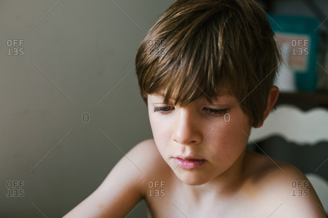 Portrait of a little boy looking away