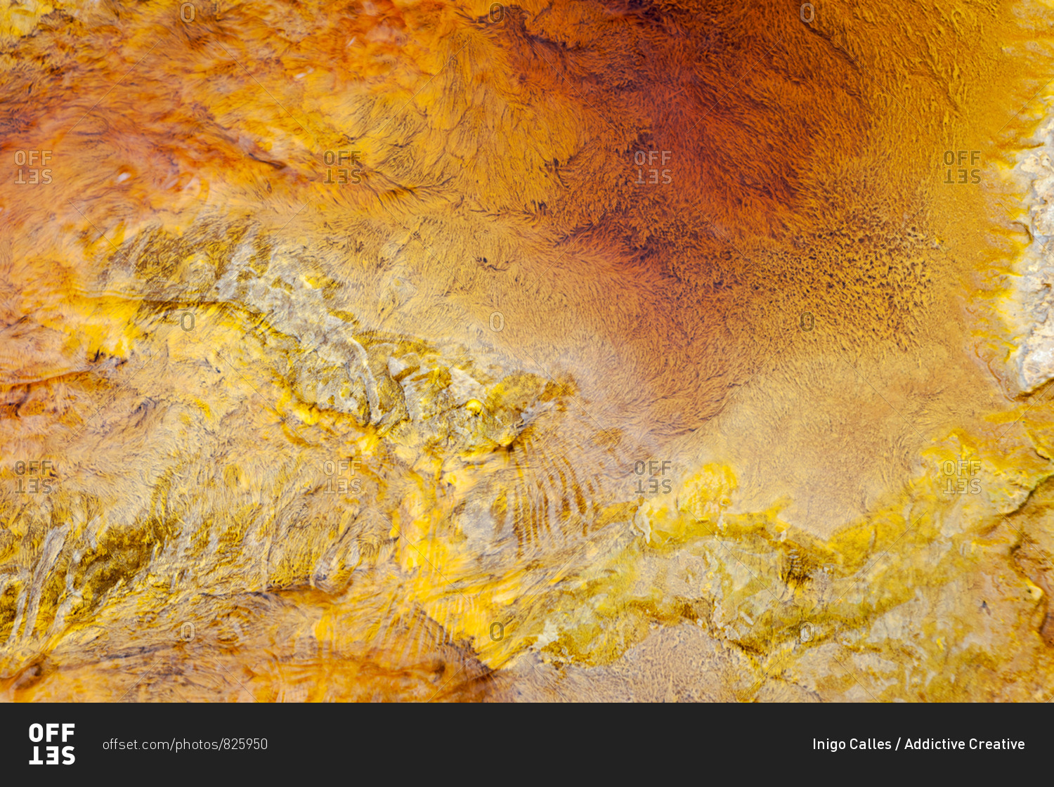 From above beautiful orange streams and transitions on rock in Mines of Riotinto Huelva