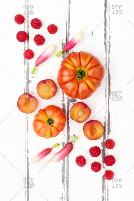 Red produce on wooden table