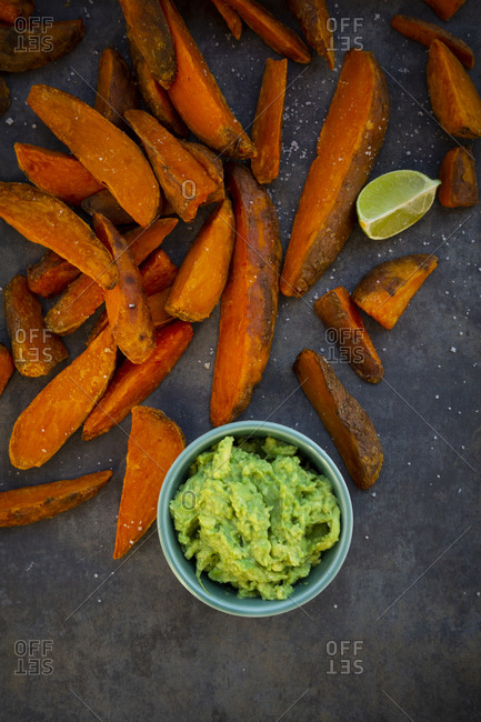 Sweet potato wedges with avocado dip and fleur de sel