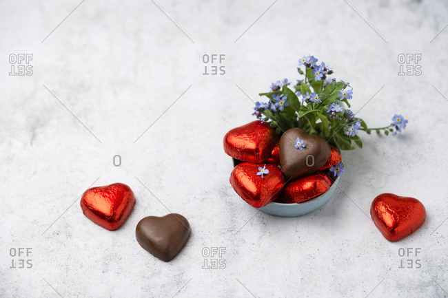 Chocolate hearts and Forget-me-not on marble