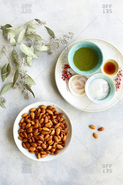 Plate of smoky almonds and seasoning ingredients