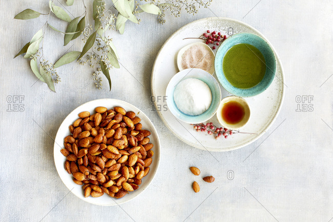 Plate of smoky almonds and seasoning ingredients