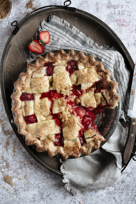 A strawberry fruit pie with a lattice pastry crust