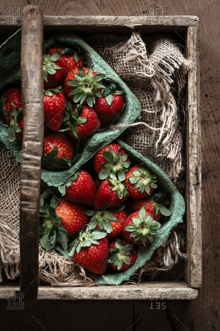 Fresh ripe strawberries on a rustic background