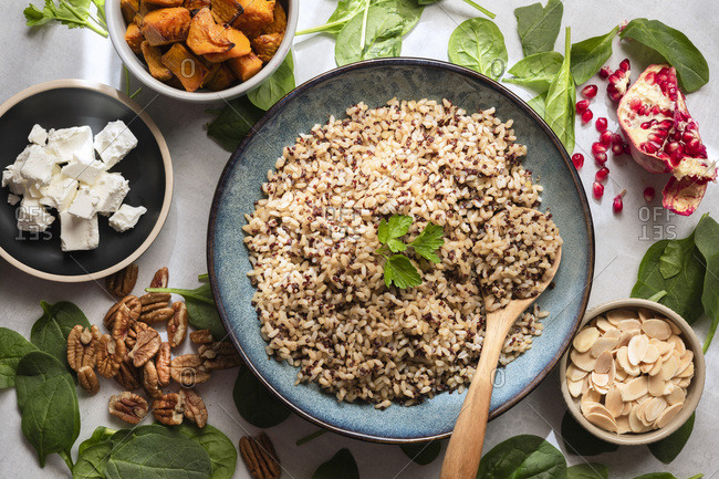 Ingredients for a mixed grain, pomegranate and pumpkin salad.