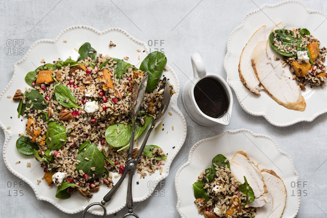 Roasted chicken breast served with a healthy rice, quinoa and pumpkin salad.